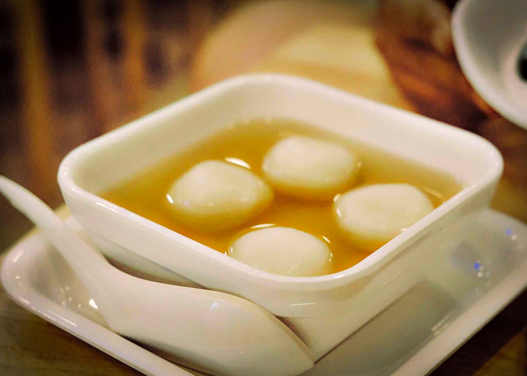 Savor sweet flavors with friends on a Hue food tour